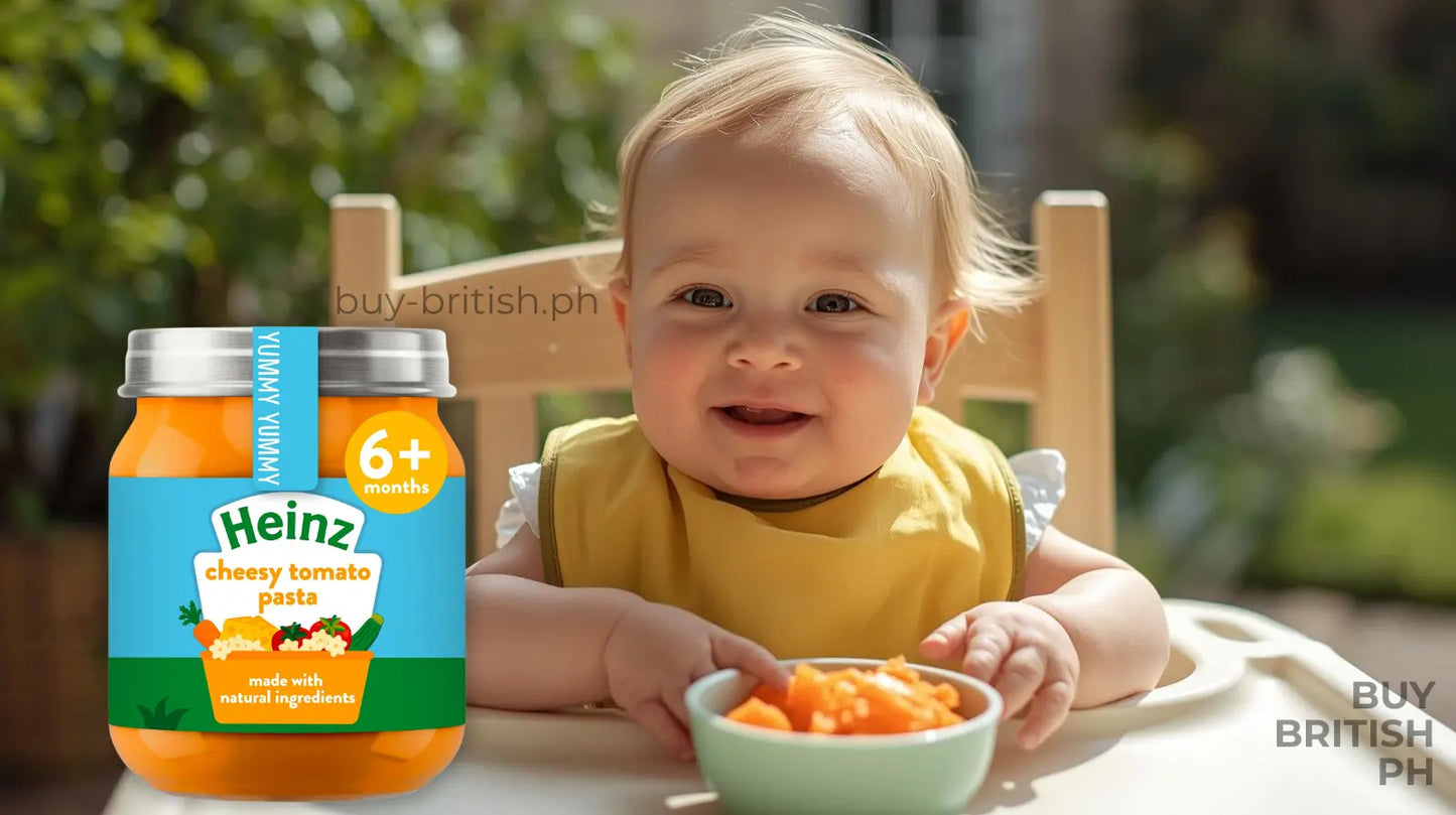Baby eating from a bowl with Heinz baby food packaging in the foreground.