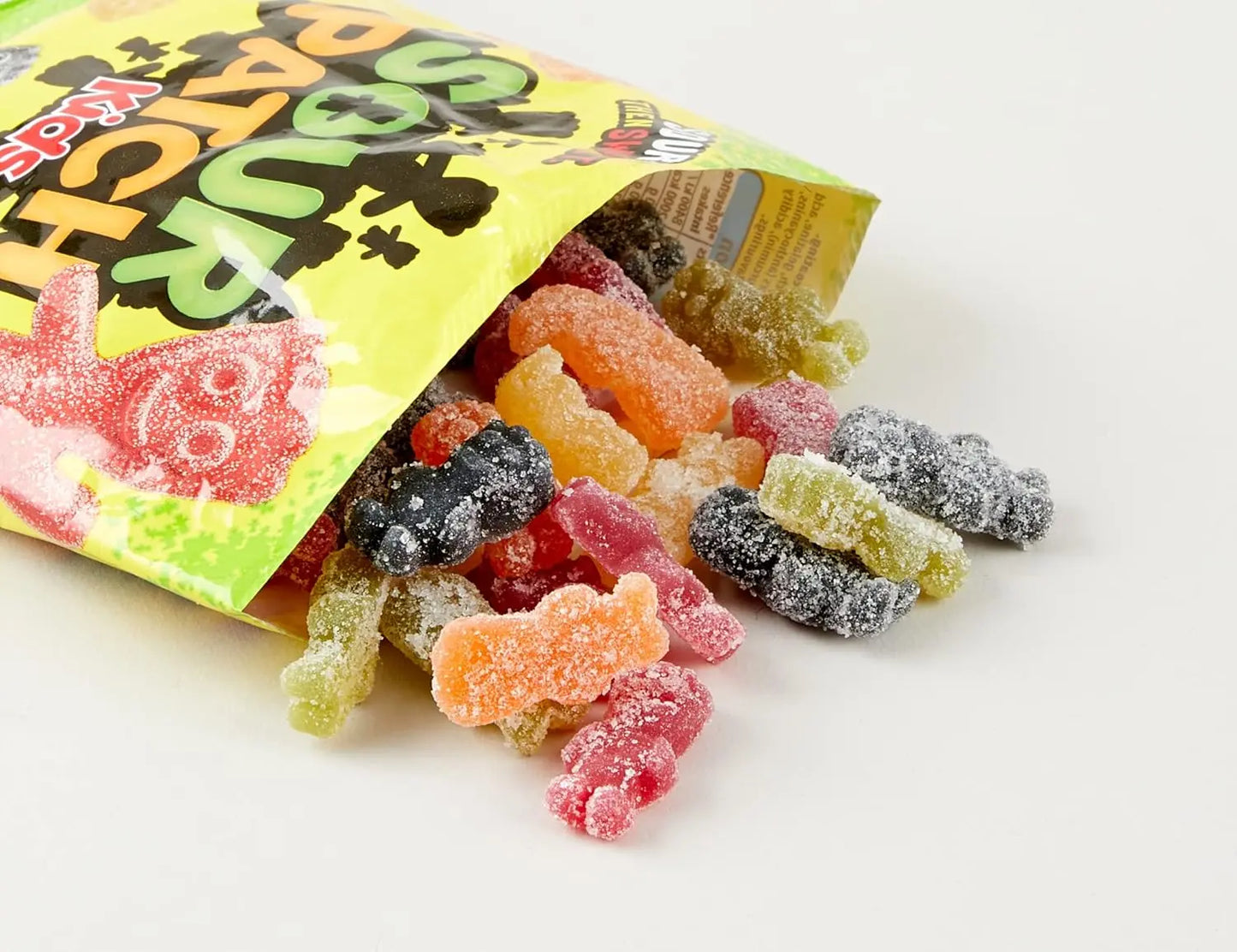 Open bag of colorful gummy bears with a visible brand logo on a white background