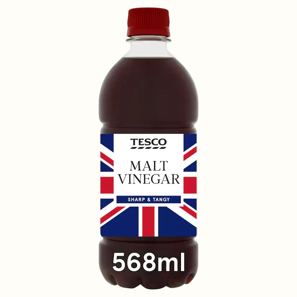 Bottle of Tesco Malt Vinegar with a Union Jack label on a white background
