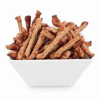 Assorted British snacks including twiglets and nuts