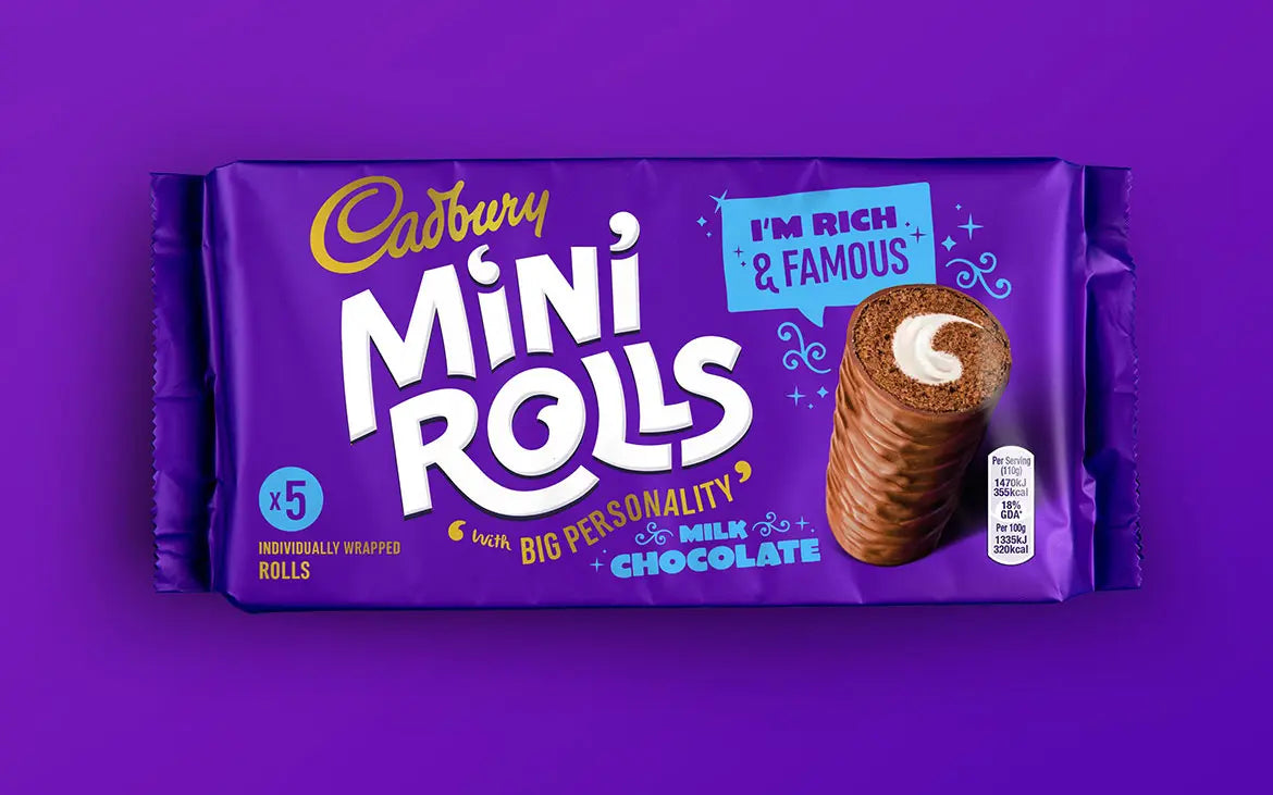 Cadbury Mini Rolls packaging on a purple background