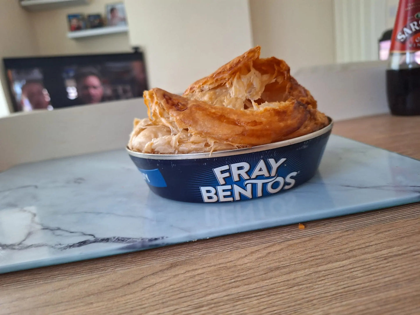 Fray Bentos container with food on a marble surface