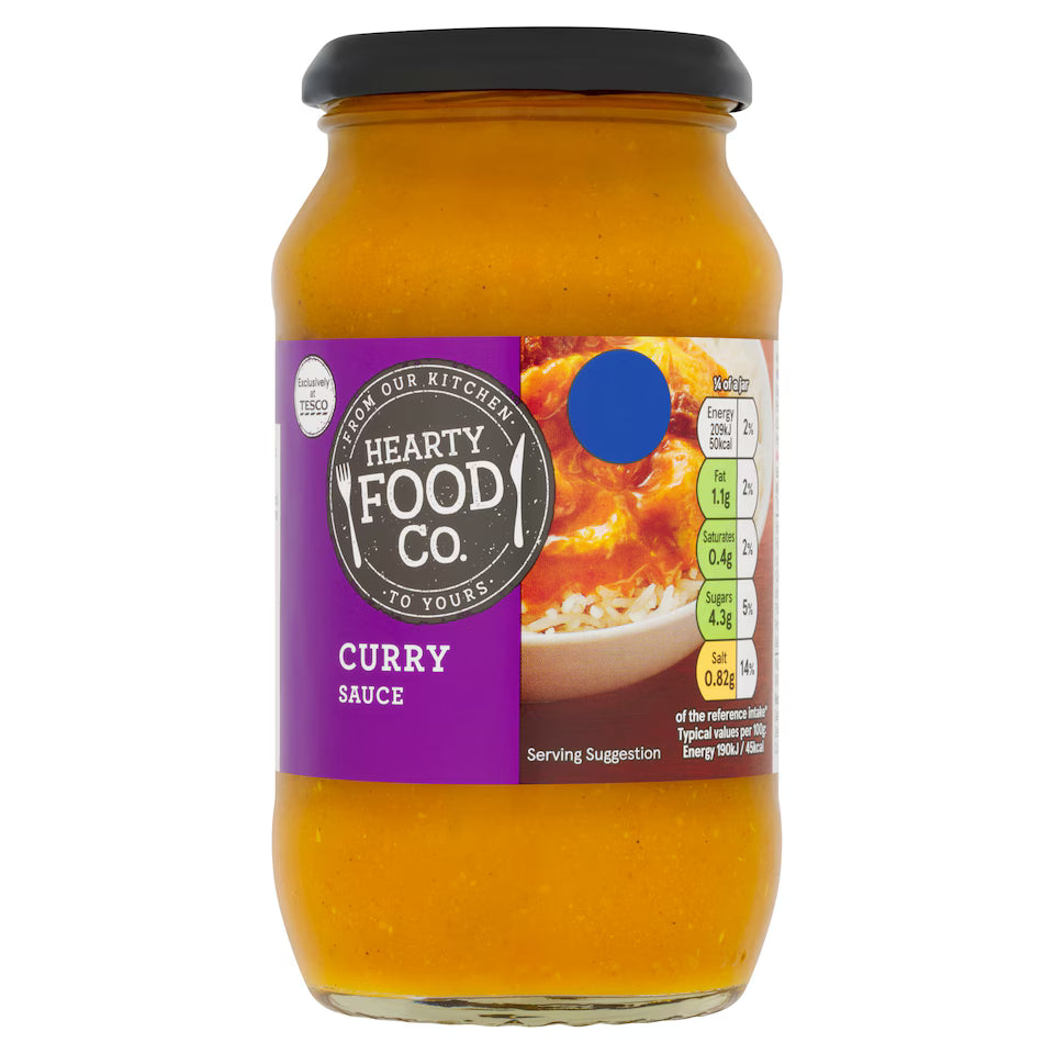 Jar of Hearty Food Co. Curry Sauce on a white background