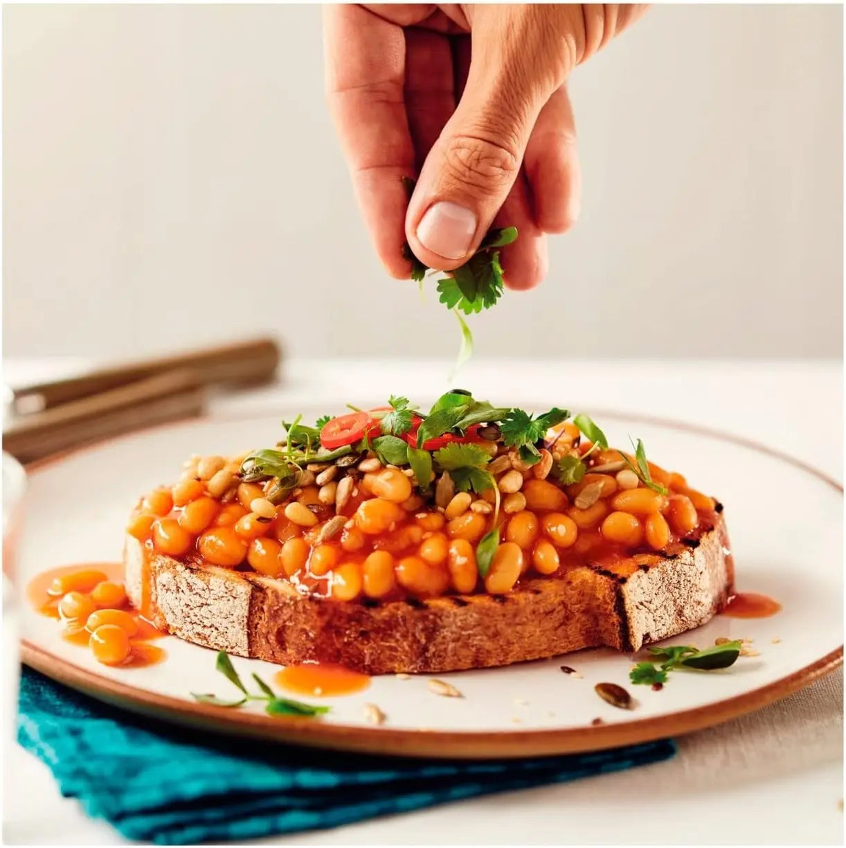 Heinz Baked Beans in a Rich Tomato Sauce on Toast.