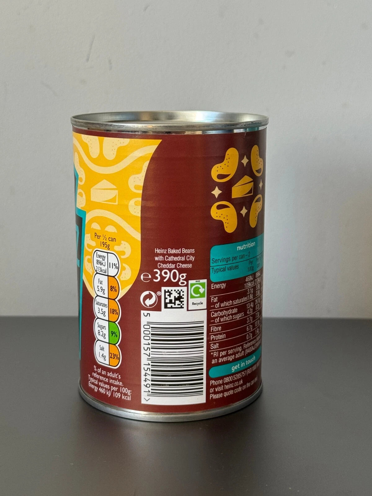 Can of food with nutritional information on a gray surface