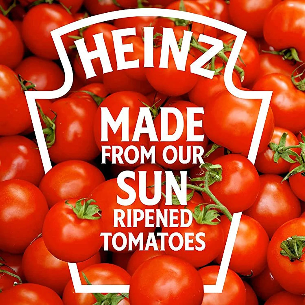 HEINZ logo with tomatoes and text 'Made from our sun ripened tomatoes' on a background of red tomatoes.