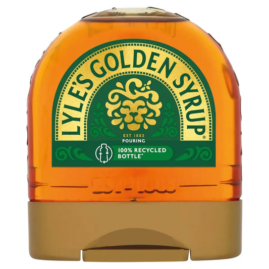 Lyle's Golden Syrup bottle with green label on a white background