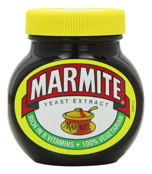 Jar of Marmite yeast extract with a yellow lid on a white background