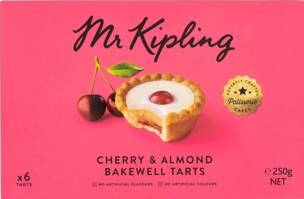 Box of Mr Kipling Cherry & Almond Bakewell Tarts on a pink background
