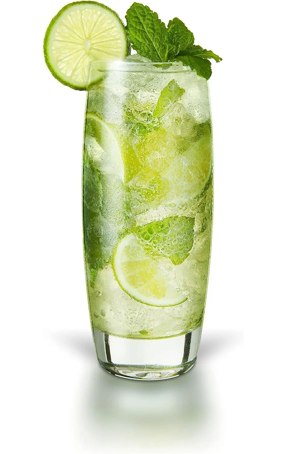 A tall clear glass filled with a light green iced beverage, garnished with lime slices, mint leaves, and a lime wheel on a white background.