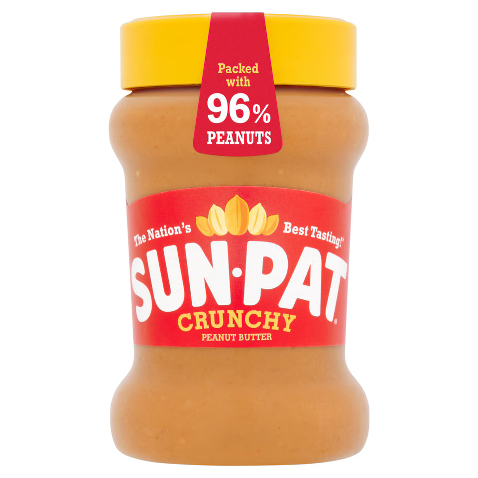 Sun-Pat Crunchy Peanut Butter jar with red label and yellow lid on a white background