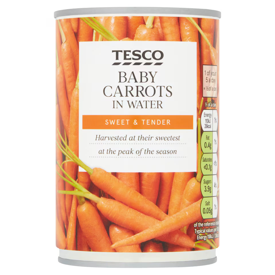 Can of Tesco baby carrots in water on a white background