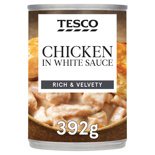 Can of Tesco Chicken in White Sauce with visible branding and product details.