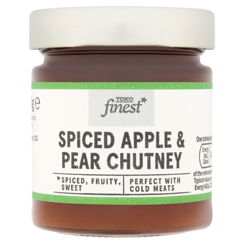 Jar of Tesco Finest Spiced Apple & Pear Chutney on a white background