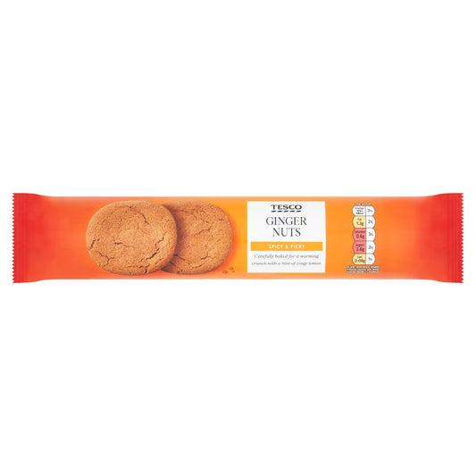 Packaged ginger nuts with Tesco branding on an orange background