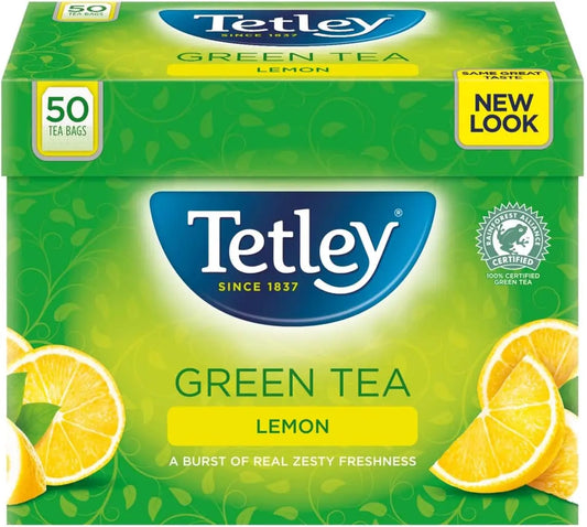 Box of Tetley Green Tea Lemon with lemon slices on a green background