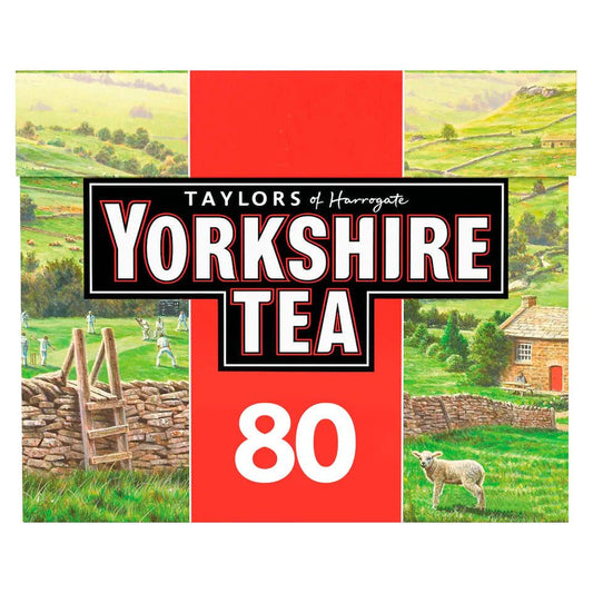 Yorkshire Tea packaging with a scenic landscape and sheep on a white background