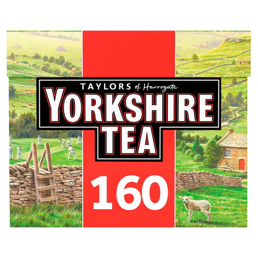 Yorkshire Tea packaging with a scenic background of fields and a sheep.